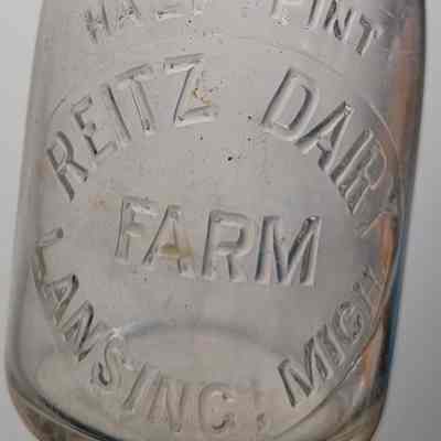 Reitz Dairy Farm Embossed Half Pint Bottle