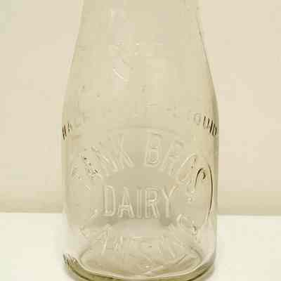 Tank Bros. Dairy Embossed Half Pint Bottle