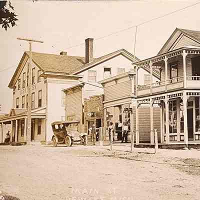 Main St., DeWitt, Mich. RPPC by Hewitt