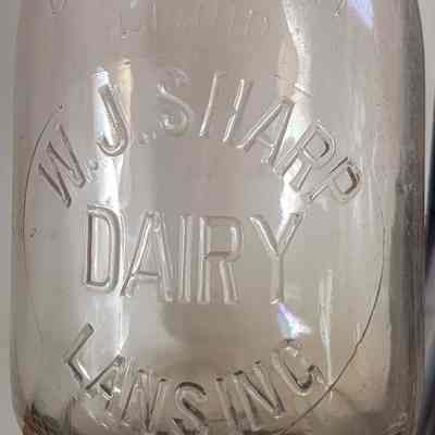 W.J. Sharp Dairy Embossed Quart Bottle