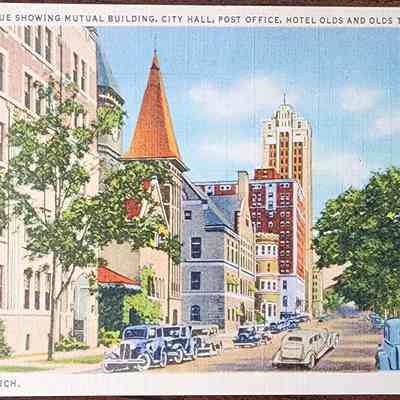 Capitol Avenue Showing Mutual Building, City Hall, Post Office, Hotel Olds and Olds Tower Building Postcard