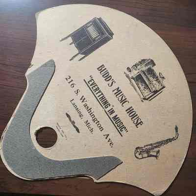 Budd's Music House Advertising Fan