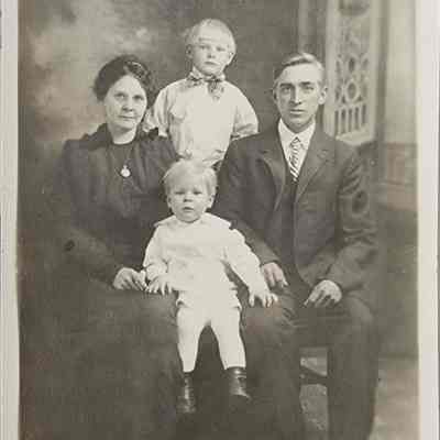 Martin, Crystal, Leonard, and Donald Anderson RPPC by Comet