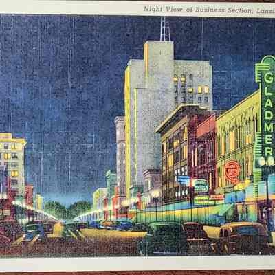 Night View of Business Section, Lansing, Michigan Postcard