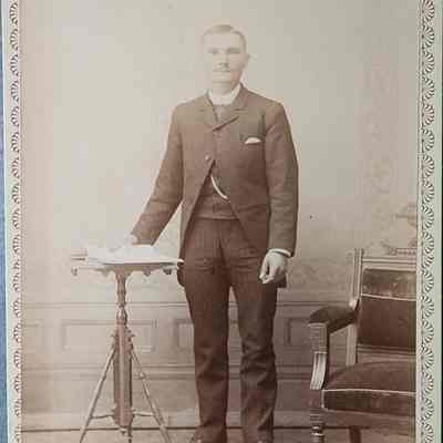 Portrait of a Man Cabinet Card by Savigny and Christmas