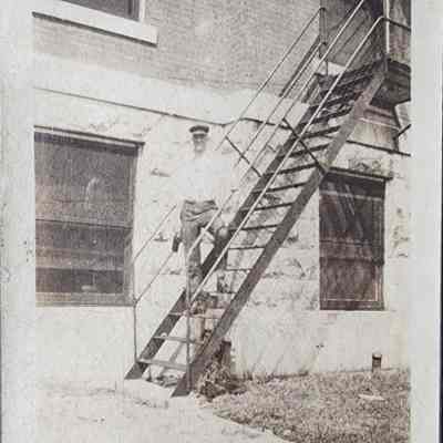 Man on Olds Hall Fire Escape Snapshot Photo