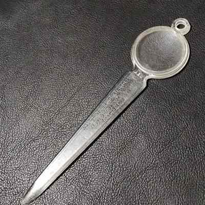 Walter Neller Co. Realtors Letter Opener and Magnifier