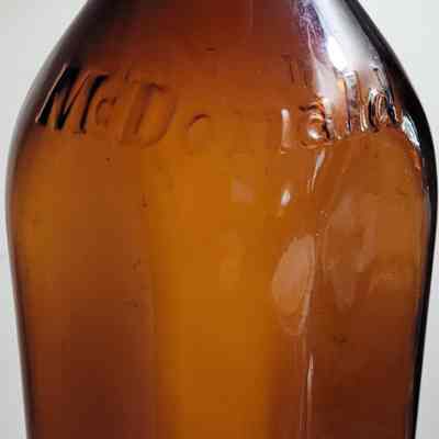 McDonald Amber Embossed Square Quart Bottle