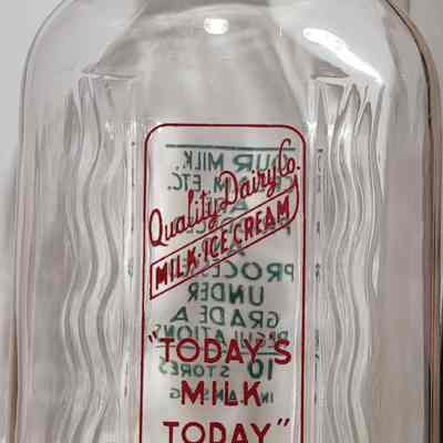 Quality Dairy 10 Store Slogan Half Gallon Bottle