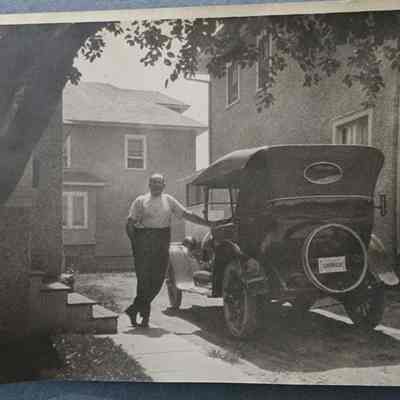 Man with Car in Lansing Snapshot Photo