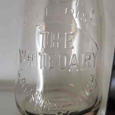 White Dairy Embossed Half Pint Bottle