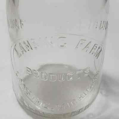 Lansing Farm Products Embossed Half Pint Bottle