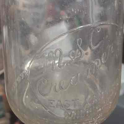 M.S.C. Creamery Embossed & Pyro Quart Bottle