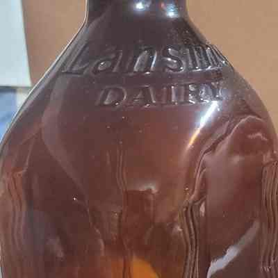 Lansing Dairy Amber Embossed Half Gallon