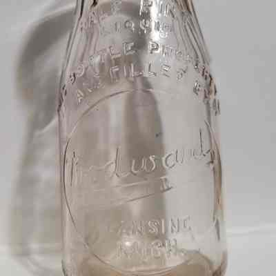 Woodward Dairy Embossed Half Pint Bottle