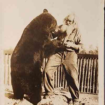Spikehorn and his Bear, Harrison, Mich., RPPC