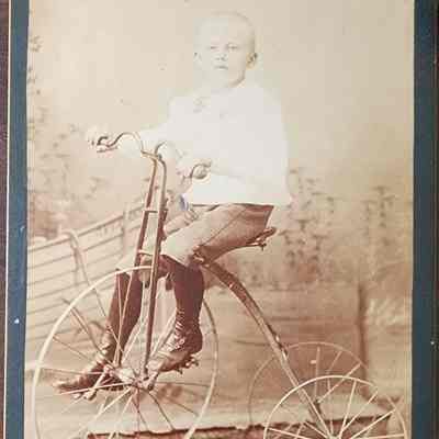 Portrait of a Child on a Tricycle Cabinet Card by Cheney & Lawson