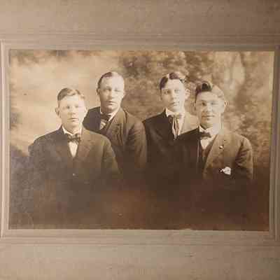 Portrait of Four Men Card Photo by Riley