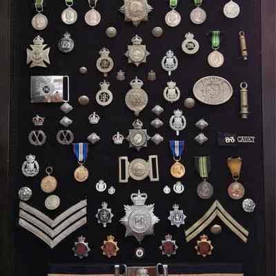 COLLECTION OF BERMUDA POLICE INSIGNIA, BADGES AND MEDALS