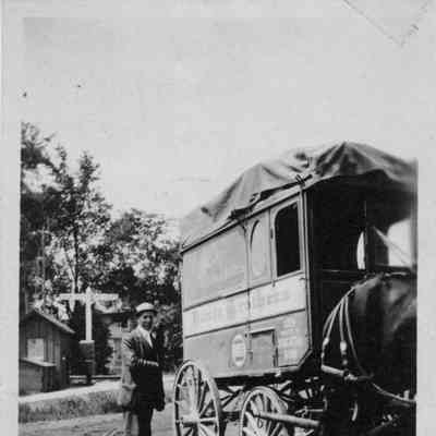 PH-1269-Roy Rugen's father with wagon (Boote Brothers-Chocolate, Gum) (R.R. gateman's house in background)