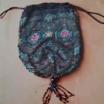 Satchel Type Evening Bag with a A Drawstring Closure