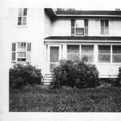 PH-1182b- Herman Rugen Sr., house in original location on Sherman Rd inside NASG gate