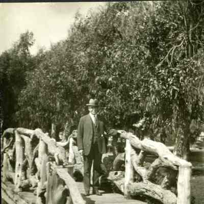 PH-1201- Charlie D. Rugen standing on bridge in CA