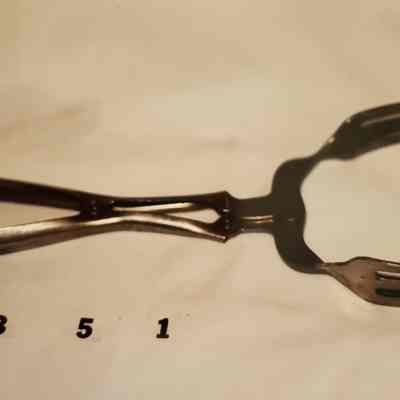 Utensil to Lift Jars out of Water for Canning