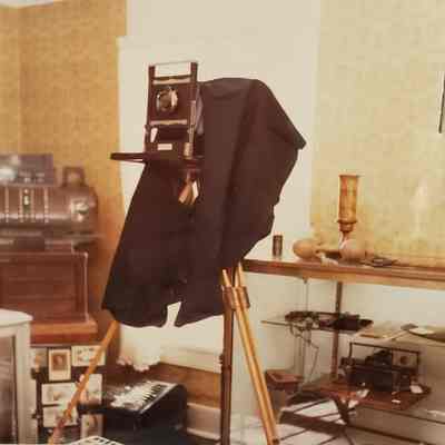 Camera with Canvas Cape and Wood Tripod