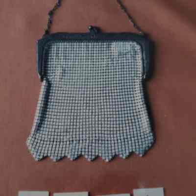 White Metal Mesh Bag - Metal Top and Chain. Clasp Done in a Floral Motif
