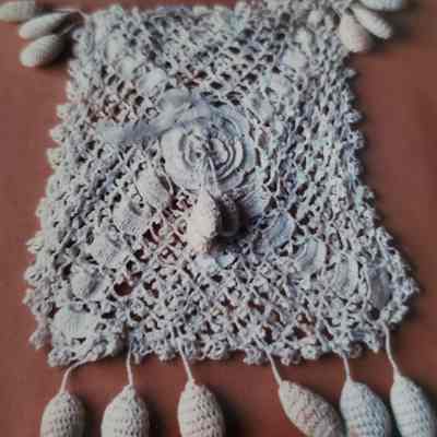 Bag, Crocheted Completely. 3 Teardrop Shaped Balls on Top Each Side, 3 in Center of Front and Across Bottom