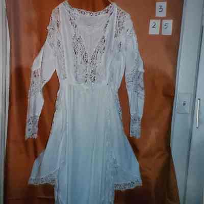Dress of Fine Cotton with Front Peplum