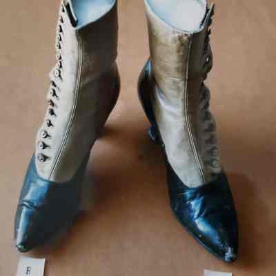 High Topped, Side Buttoning Boots with the Bottom of Black Leather and Tops of Beige Leather