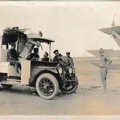Ambulance and JN-4 [Photograph]
