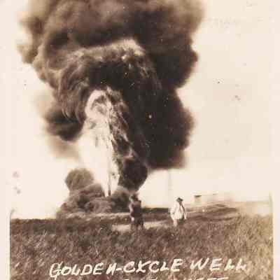 Golden Cycle Well Gushing Oil on Fire [Photograph]