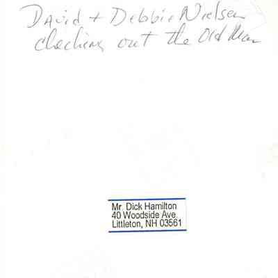 Back of photograph with Dick Hamilton's sticker and another inscription.