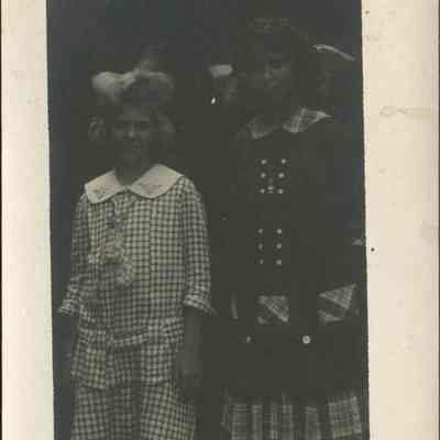 Two Girls in Dresses and Bows