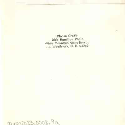 Back of photo with Dick Hamilton's stamp.