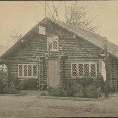 Building with Car Parked to the Side