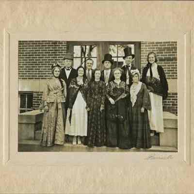 Group in Front of Brick Building
