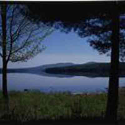 Reflections on Moore Dam in Littleton, NH