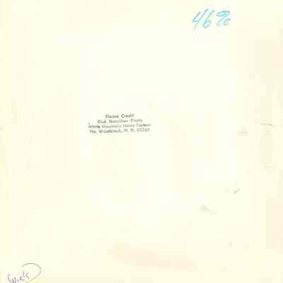 Back of photograph with Dick Hamilton's stamp and other inscriptions.