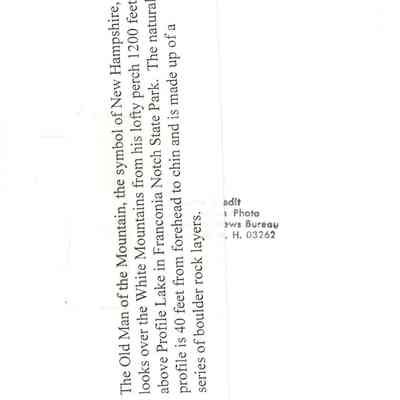 Back of photograph with text description.