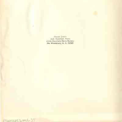 Back of photograph with Dick Hamilton's stamp.