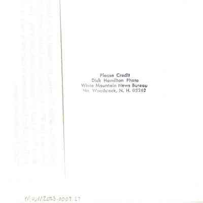 Back of photograph with Dick Hamilton's stamp.