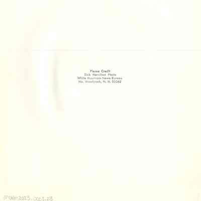 Back of photograph with Dick Hamilton's stamp.