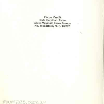 Back of photograph with Dick Hamilton's stamp.