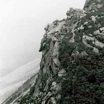 Niels Nielsen and others atop Cannon Cliff and The Old Man of the Mountain