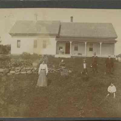 People in Front of House