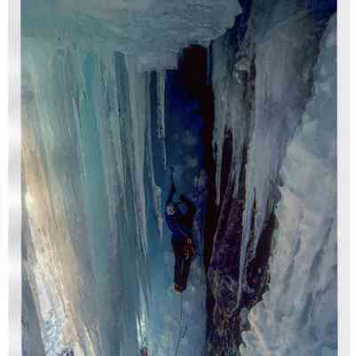 Ice Climber Under Overhang